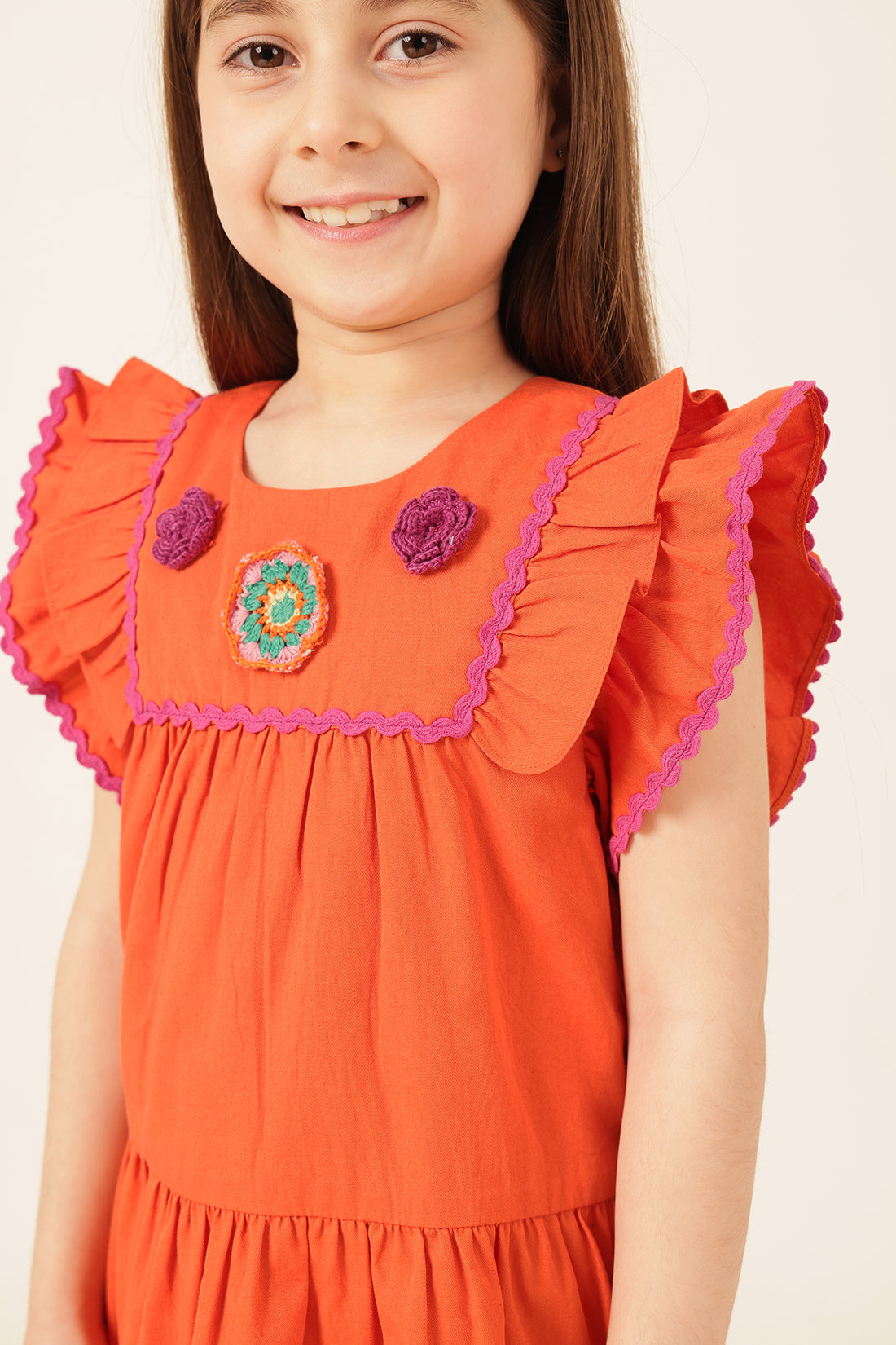लड़कियों की नारंगी कॉटन टवील ड्रेस