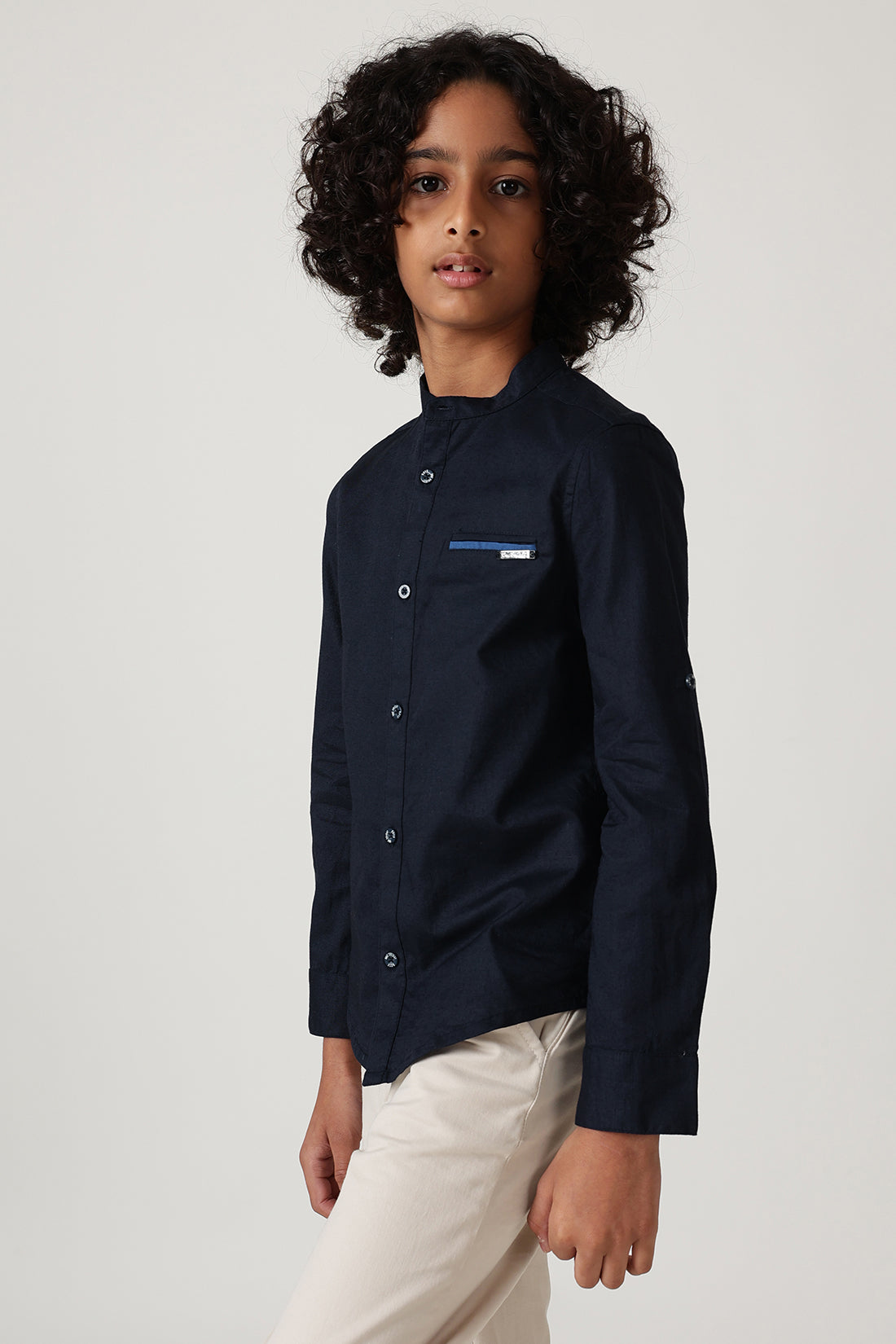 boy in full sleeve shirt